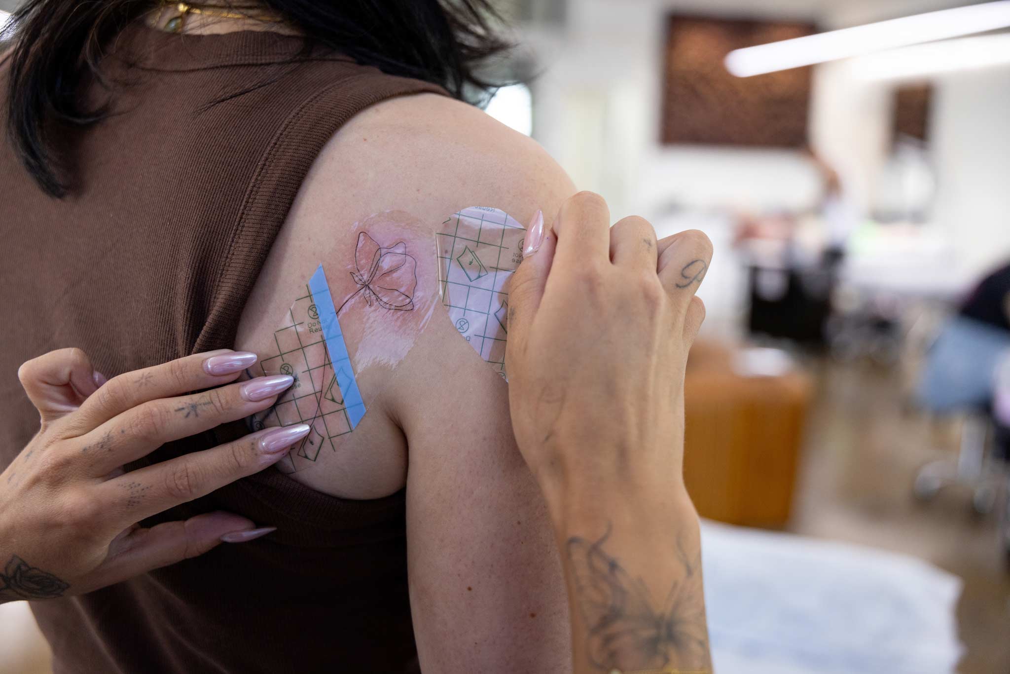 flower tattoo being applied